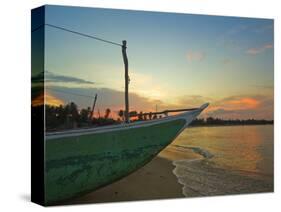 Outrigger Boat at Sunset at This Fishing Beach and Popular Tourist Surf Destination, Arugam Bay, Ea-Robert Francis-Stretched Canvas