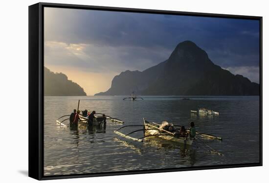 Outrigger Boat at Sunset in the Bay of El Nido, Bacuit Archipelago, Palawan, Philippines-Michael Runkel-Framed Stretched Canvas