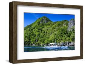 Outrigger Boat Cruising in the Bay of El Nido, Bacuit Archipelago, Palawan, Philippines-Michael Runkel-Framed Photographic Print