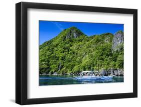 Outrigger Boat Cruising in the Bay of El Nido, Bacuit Archipelago, Palawan, Philippines-Michael Runkel-Framed Photographic Print