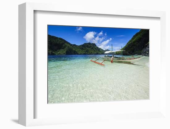 Outrigger Boat in the Crystal Clear Water in the Bacuit Archipelago, Palawan, Philippines-Michael Runkel-Framed Photographic Print