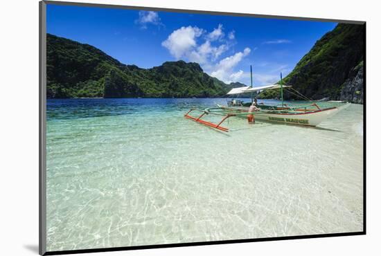 Outrigger Boat in the Crystal Clear Water in the Bacuit Archipelago, Palawan, Philippines-Michael Runkel-Mounted Photographic Print