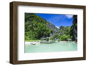 Outrigger Boat in the Crystal Clear Water in the Bacuit Archipelago, Palawan, Philippines-Michael Runkel-Framed Photographic Print