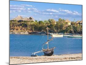 Outrigger Boat Lying on Bank of Sand, Antsanitian Beach Resort, Mahajanga, Madagascar-Michael Runkel-Mounted Photographic Print