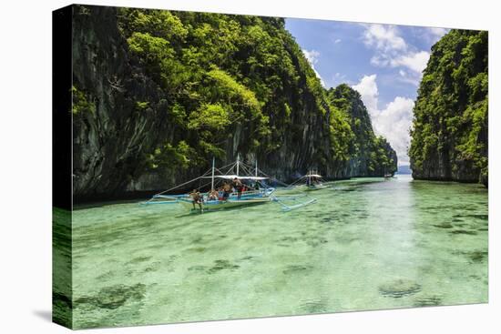 Outrigger Boats in the Crystal Clear Water in the Bacuit Archipelago, Palawan, Philippines-Michael Runkel-Stretched Canvas