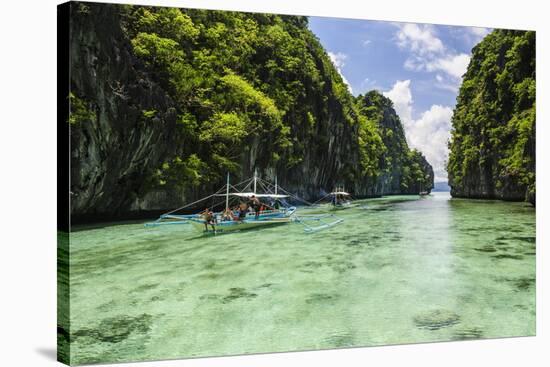 Outrigger Boats in the Crystal Clear Water in the Bacuit Archipelago, Palawan, Philippines-Michael Runkel-Stretched Canvas