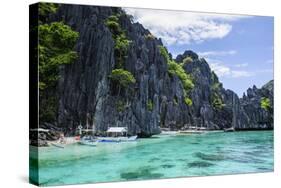 Outrigger Boats in the Crystal Clear Water in the Bacuit Archipelago, Palawan, Philippines-Michael Runkel-Stretched Canvas