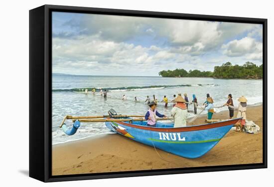 Outrigger Fishing Boat and People Pulling Net in by Hand to Shore Near Batu Karas-Rob-Framed Stretched Canvas