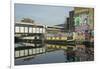 Overground train drives past canal by artists studios and warehouses in Hackney Wick, London, Engla-Julio Etchart-Framed Photographic Print