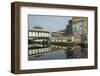 Overground train drives past canal by artists studios and warehouses in Hackney Wick, London, Engla-Julio Etchart-Framed Photographic Print