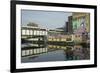 Overground train drives past canal by artists studios and warehouses in Hackney Wick, London, Engla-Julio Etchart-Framed Photographic Print