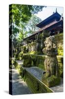 Overgrown Statues in a Temple in the Monkey Forest, Ubud, Bali, Indonesia, Southeast Asia, Asia-Michael Runkel-Stretched Canvas