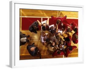 Overhead View of Coach Instructing High School Basketball Team-null-Framed Photographic Print