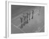 Overhead View of People with Umbrellas Waiting For the Tram, Melbourne, Australia-Emil Otto Hoppé-Framed Photographic Print