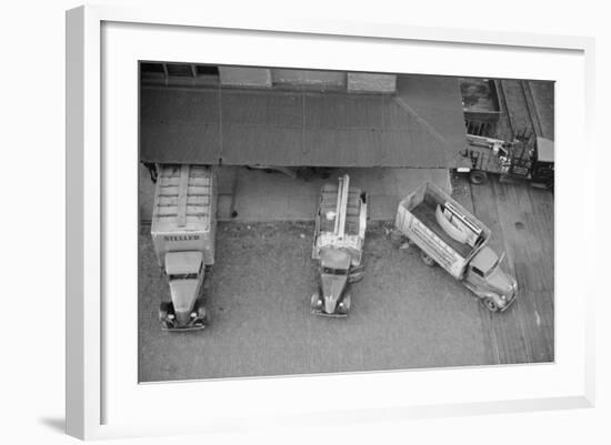 Overhead View of Trucks Loading at Warehouse, Minneapolis, 1939-null-Framed Photo