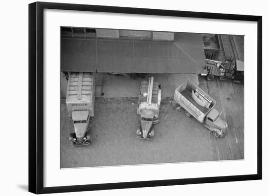 Overhead View of Trucks Loading at Warehouse, Minneapolis, 1939-null-Framed Photo