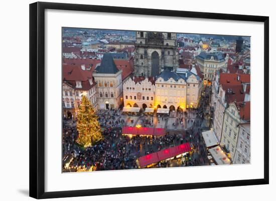 Overview of the Christmas Market and the Church of Our Lady of Tyn on the Old Town Square-Miles Ertman-Framed Photographic Print