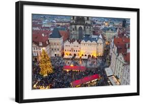 Overview of the Christmas Market and the Church of Our Lady of Tyn on the Old Town Square-Miles Ertman-Framed Photographic Print