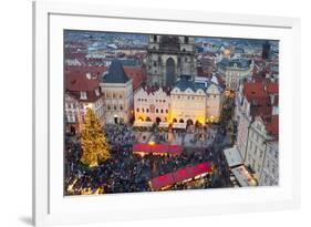 Overview of the Christmas Market and the Church of Our Lady of Tyn on the Old Town Square-Miles Ertman-Framed Photographic Print