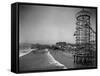 Overview Seaside Amusement Park, Waders in Ocean, Rollercoasters and Activity Centers on Boardwalk-Henry G^ Peabody-Framed Stretched Canvas