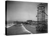 Overview Seaside Amusement Park, Waders in Ocean, Rollercoasters and Activity Centers on Boardwalk-Henry G^ Peabody-Stretched Canvas