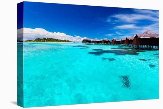 Overwater Bungallows in Blue Lagoon around Tropical Island-Martin Valigursky-Stretched Canvas