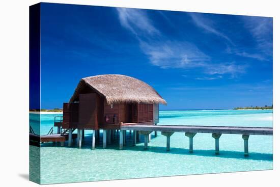 Overwater Villas in Blue Lagoon of a Tropical Island-Martin Valigursky-Stretched Canvas