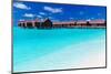 Overwater Villas in Blue Tropical Lagoon with White Sandy Beach-Martin Valigursky-Mounted Photographic Print