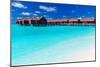 Overwater Villas in Blue Tropical Lagoon with White Sandy Beach-Martin Valigursky-Mounted Photographic Print