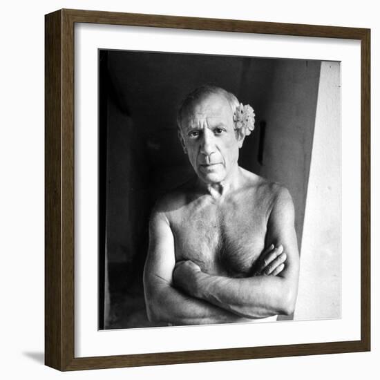 Pablo Picasso, Bare Chested and with Flower Tucked Behind Ear-Gjon Mili-Framed Premium Photographic Print