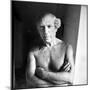 Pablo Picasso, Bare Chested and with Flower Tucked Behind Ear-Gjon Mili-Mounted Premium Photographic Print
