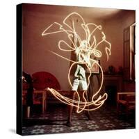 Pablo Picasso Creating Light Drawing of Vase of Flowers, Alone-Gjon Mili-Stretched Canvas