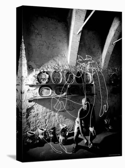 Pablo Picasso Drawing a Centaur in the Air with a Flashlight at Madoura Pottery-Gjon Mili-Stretched Canvas