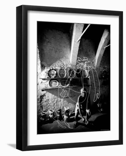 Pablo Picasso Drawing a Centaur in the Air with a Flashlight at Madoura Pottery-Gjon Mili-Framed Premium Photographic Print
