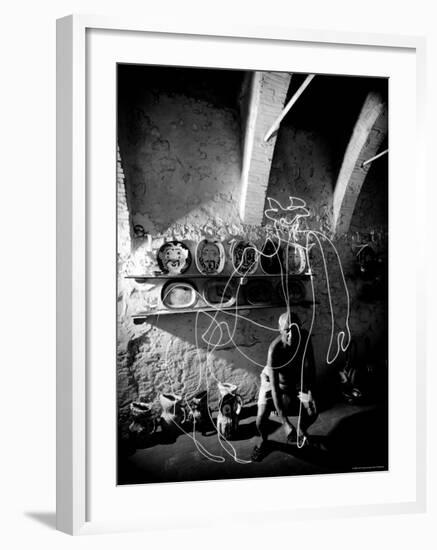 Pablo Picasso Drawing a Centaur in the Air with a Flashlight at Madoura Pottery-Gjon Mili-Framed Premium Photographic Print