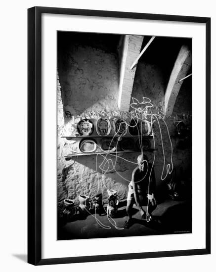 Pablo Picasso Drawing a Centaur in the Air with a Flashlight at Madoura Pottery-Gjon Mili-Framed Premium Photographic Print