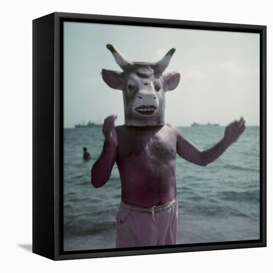 Pablo Picasso Wearing a Cow's Head Mask on Beach at Golfe Juan Near Vallauris-Gjon Mili-Framed Stretched Canvas