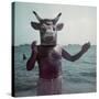 Pablo Picasso Wearing a Cow's Head Mask on Beach at Golfe Juan Near Vallauris-Gjon Mili-Stretched Canvas