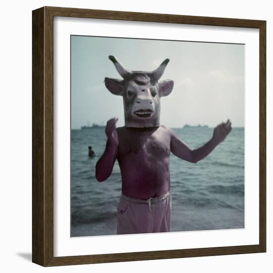 Pablo Picasso Wearing a Cow's Head Mask on Beach at Golfe Juan Near Vallauris-Gjon Mili-Framed Premium Photographic Print