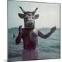 Pablo Picasso Wearing a Cow's Head Mask on Beach at Golfe Juan Near Vallauris-Gjon Mili-Mounted Premium Photographic Print
