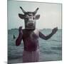 Pablo Picasso Wearing a Cow's Head Mask on Beach at Golfe Juan Near Vallauris-Gjon Mili-Mounted Premium Photographic Print