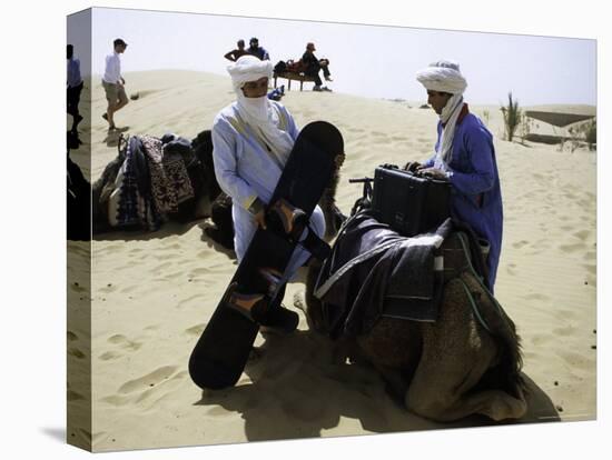 Packing up a Camel, Morocco-Michael Brown-Stretched Canvas