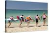 Paddleboarders on the beach, Surfers Paradise, City of Gold Coast, Queensland, Australia-Panoramic Images-Stretched Canvas