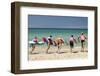 Paddleboarders on the beach, Surfers Paradise, City of Gold Coast, Queensland, Australia-Panoramic Images-Framed Photographic Print