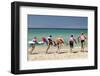 Paddleboarders on the beach, Surfers Paradise, City of Gold Coast, Queensland, Australia-Panoramic Images-Framed Photographic Print