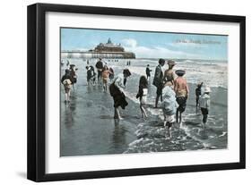 Paddling Eastbourne-null-Framed Art Print