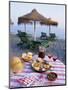 Paella with Olives, Bread and Sangria on a Table on the Beach in Andalucia, Spain-Michael Busselle-Mounted Photographic Print