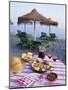 Paella with Olives, Bread and Sangria on a Table on the Beach in Andalucia, Spain-Michael Busselle-Mounted Photographic Print