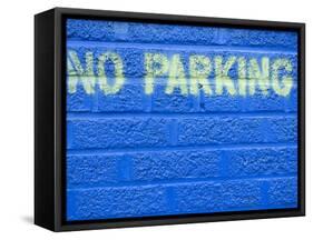 Painted Blue Brick Wall with No Parking Sign-John Nordell-Framed Stretched Canvas