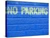 Painted Blue Brick Wall with No Parking Sign-John Nordell-Stretched Canvas